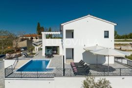 Istra, Krnica - moderna samostojeća kuća s bazenom i pogledom na more, NKP 200 m2, Marčana, Kuća
